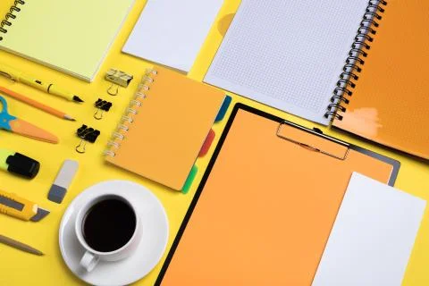 Flat lay composition with stationery on yellow background. Mock up for design Stock Photos
