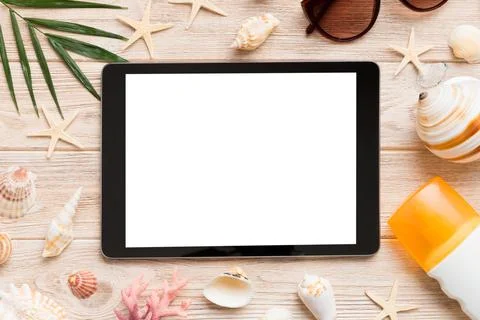 Flat lay composition with tablet and beach accessories on colored background. Fotos Stock