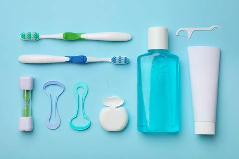 Flat lay composition with tongue cleaner on color background Stock Photos
