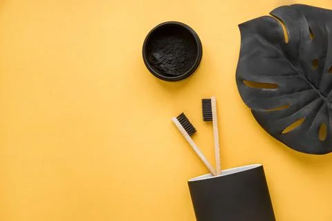 Flat lay composition with toothpaste, oral hygiene products and space for text Stock Photos