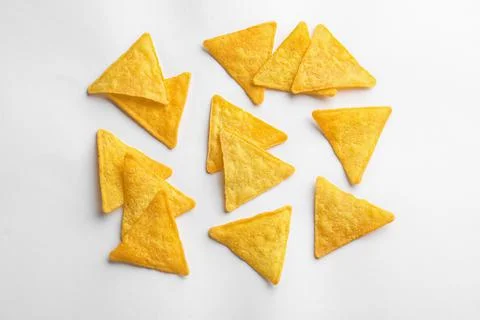 Flat lay composition of tortilla chips (nachos) on white background 写真素材