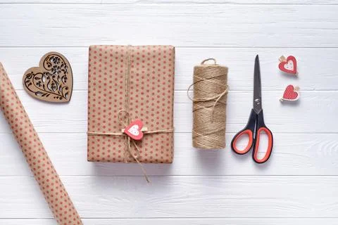 Flat lay composition on Valentine's Day, a birthday with gifts, scissors Stock Photos
