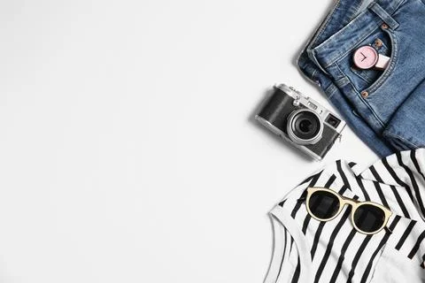 Flat lay composition with wear, camera and space for text isolated on white.  Foto stock