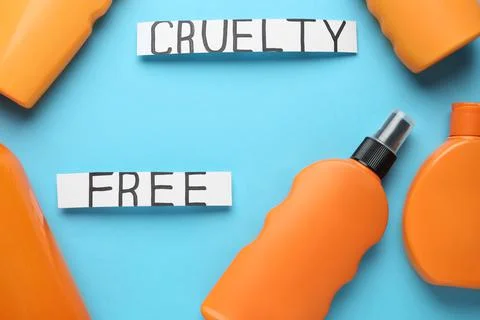 Flat lay composition with words Cruelty Free and different cosmetic products  Stock Photos