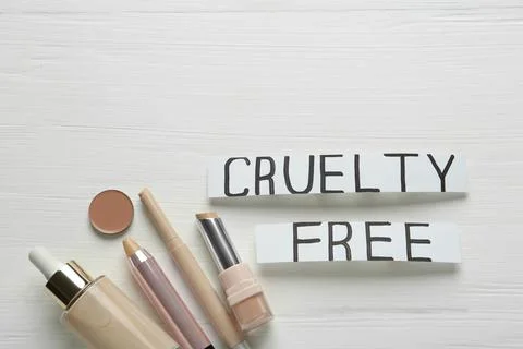 Flat lay composition with words Cruelty Free and different cosmetic products  Stock Photos