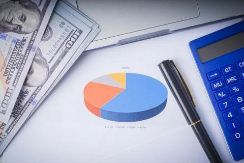 Flat lay composition of a work desk with papers, pen and calculators Stock Photos