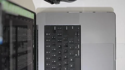 Flat lay of computer workstation with headset for online learning Stock Footage 336713559
