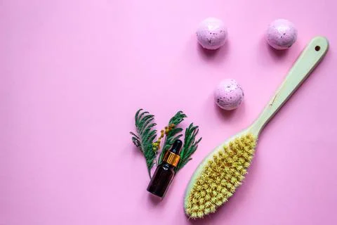 Flat lay concept of caring for your body. Massage anti-cellulite brush, serum Stock Photos