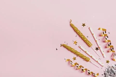 Flat lay copy space frame with candles glitter pink background Stock Photos