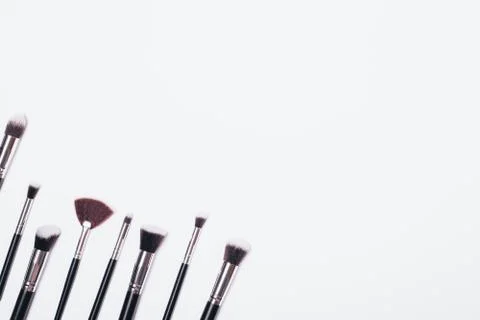 Flat lay corner composition set of professional makeup Stock Photos