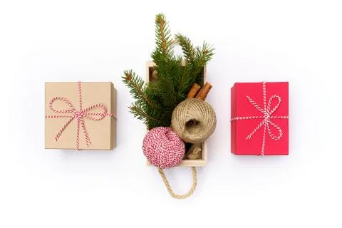 Flat lay craft box, red box, wooden box white and red rope, cinnamon on white Stock Photos