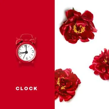 Flat lay creative morning composition of red alarm clocks pattern on gray Foto stock
