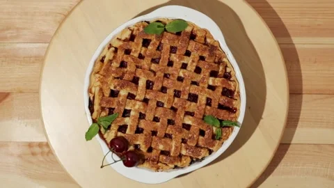 Flat lay of delicious homemade cherry pie with Flaky Crust on the wood Stock Footage 255319073