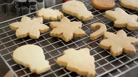 Flat lay of different shape of cookies on the metal rack on the table Stock Footage 140076021