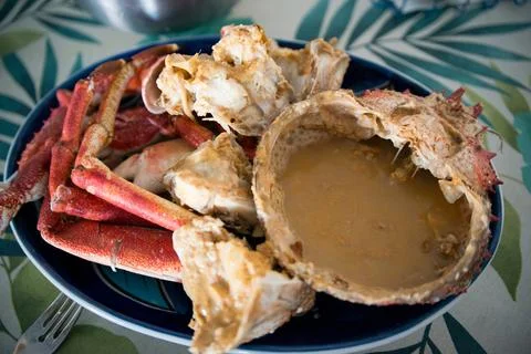 Flat lay of dish with spider crab, with carapace and legs Stock Photos