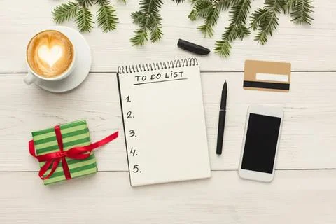 Flat lay of a to do list notebook with pen and gift box Stock Photos