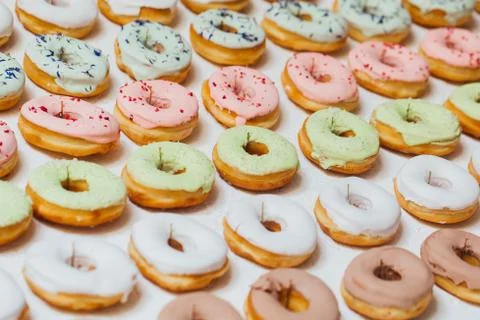 Flat lay donuts pattern on a white background. Foto stock