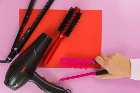 Flat lay of elements for hairdressing Stock Photos