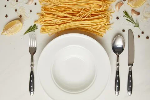 Flat lay empty plate pasta Stock Photos