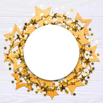 Flat lay empty round frame of big and small stars of confetti Stock Photos