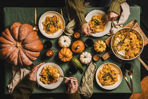 Flat-lay of Fall dinner for gathering or Thanksgiving Day celebration Stock Photos