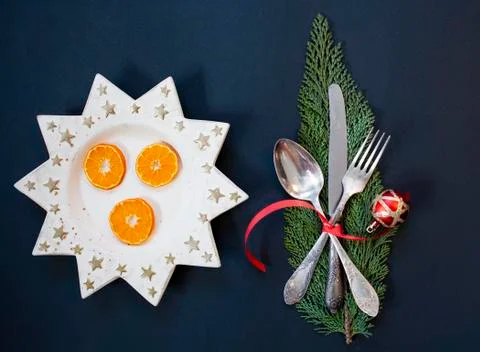 Flat lay of festive Christas table arrangement with silverware Stock Photos