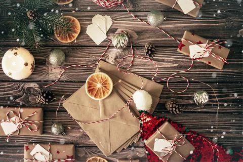 Flat lay festive christmas composition on dark wooden background Stock Photos