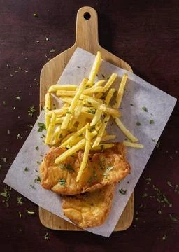 Flat lay fish chips chopping board Stock Photos