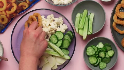 Flat lay food video: chef cooks salad from the raw vegetables and crispy fried Stock Footage 196820166