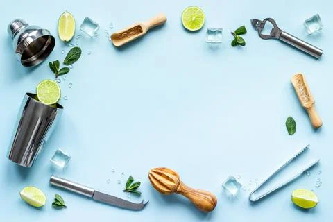 Flat lay frame of bar accessories and ingredients for mojito cocktail Stock Photos