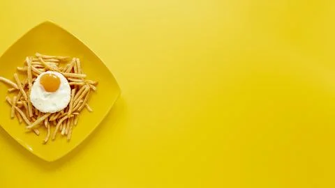 Flat lay frame with egg fries plate 스톡 사진