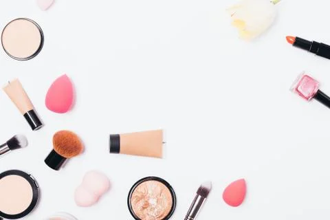Flat lay frame of makeup products Stock Photos