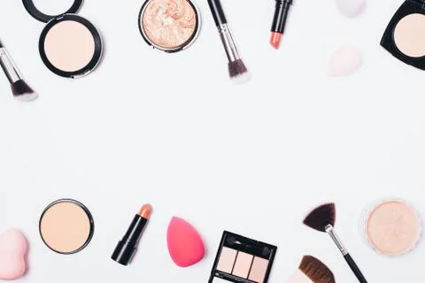 Flat lay frame of makeup products Stock Photos