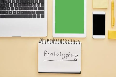 Flat lay gadgets prototyping lettering Stock Photos