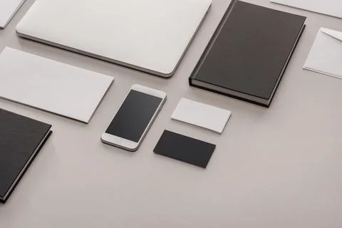 Flat lay gadgets stationery grey Stock Photos