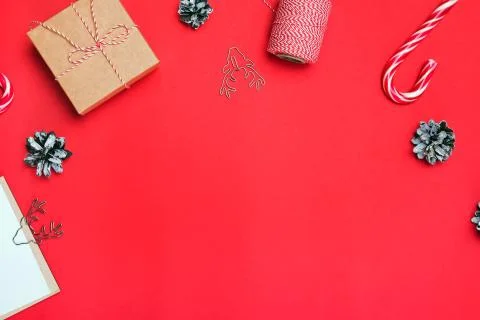 Flat lay with gift box, candy cone and other small elements and place for text Stock Photos