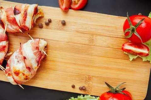 Flat Lay of Grilled Chicken and Tomato Garnish Stock Photos