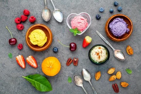 Flat lay ice cream with various fruits raspberry ,blueberry ,strawberry ,oran Stock Photos