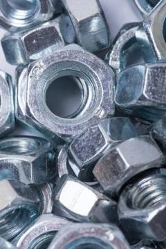 Flat lay image of metal grey nuts Stock Photos