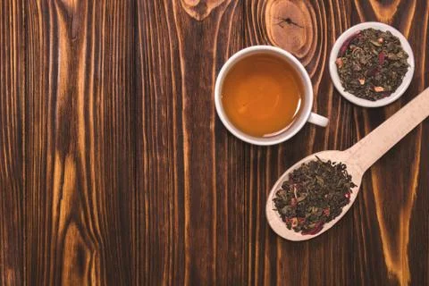 Flat lay layout with herbal tea. White cup with hot tea Stock Photos