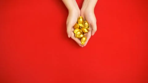 Flat lay looping footage of hand holding a lot of ancient Chinese gold bar Stock-Footage 262956192