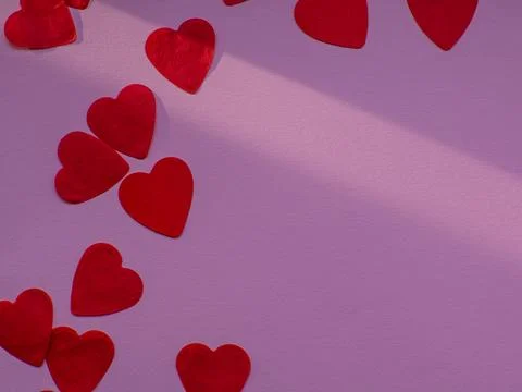 Flat lay with a lot of tiny heart-shaped papers with space for text Foto stock