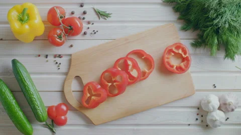 Flat lay of magic slicing a pepper, healthy vegetarian food Stock Footage 86042389