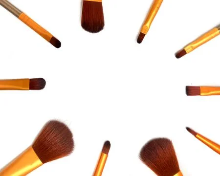 Flat lay of makeup brushes on white background. Top view point, flat lay Stock Photos