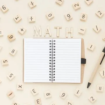 Flat lay math science scrabble board numbers with notebook Stock Photos
