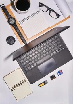Flat lay minimalist office table desk. top view  Workspace on white background Stock Photos