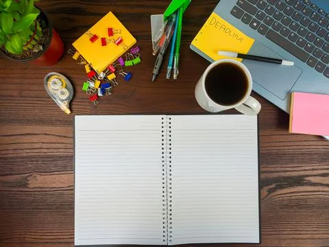 Flat lay, a mock up of a notebook. workspace in the background of the office Stock Photos