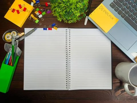 Flat lay, a mock up of a notebook. workspace in the background of the office Stock Photos