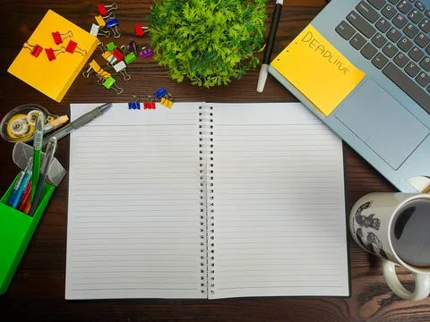 Flat lay, a mock up of a notebook. workspace in the background of the office Stock Photos