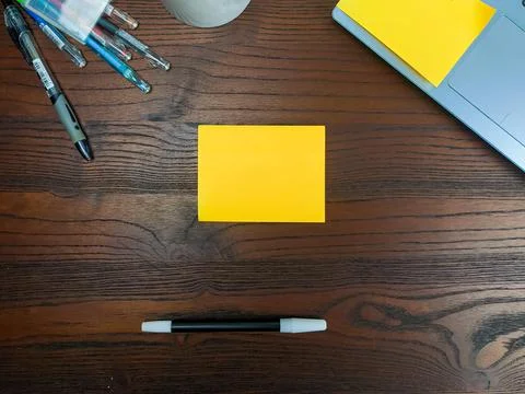 Flat lay, mock up yellow notes. workspace in the office desk Stock Photos